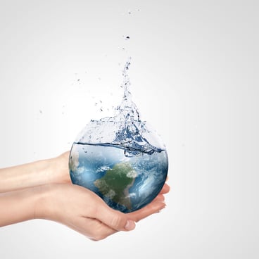 Globe in human hand against blue sky. Environmental protection concept. Elements of this image furnished by NASA.jpeg